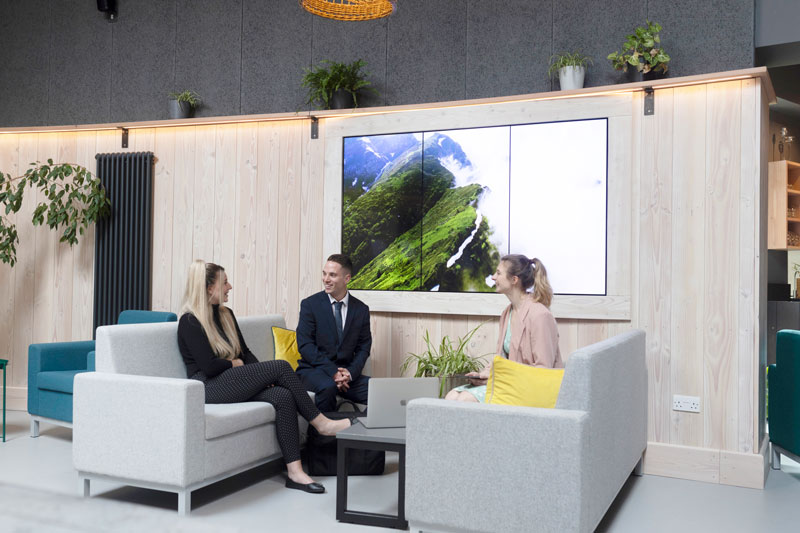 Business studies students in a reception area